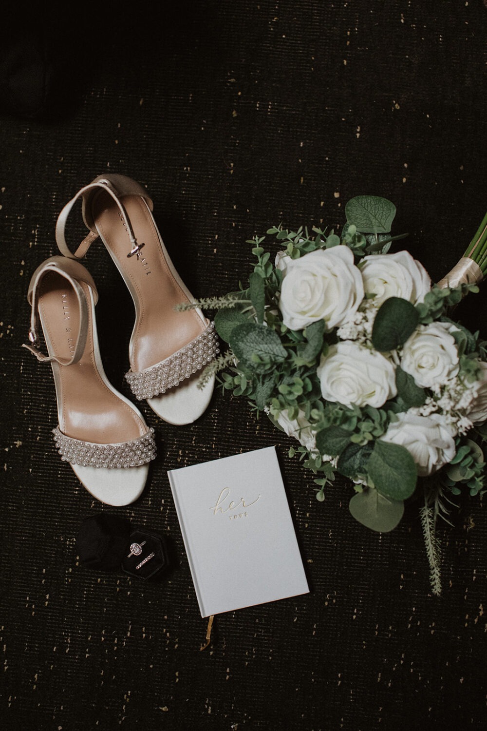 wedding accessories and white rose bouquet 