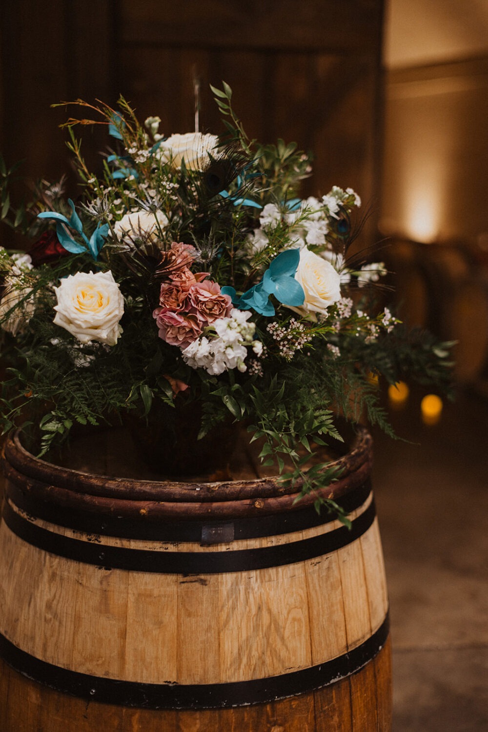 wedding florals in wine barrel following wedding planning tips and advice