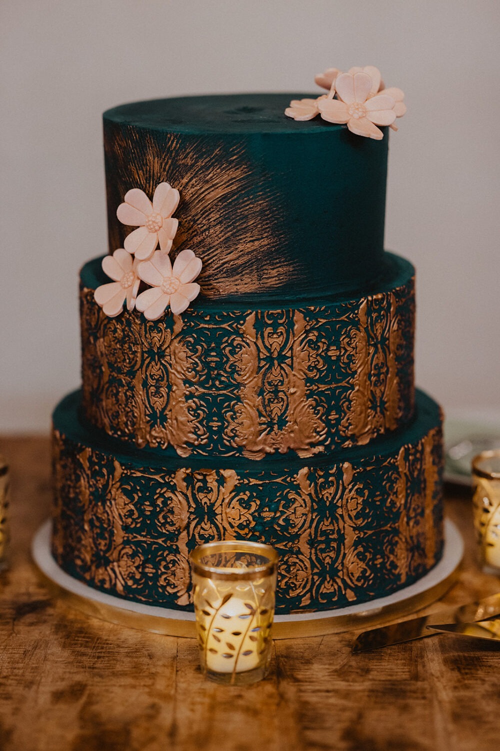 green and gold wedding cake following wedding planning tips and advice