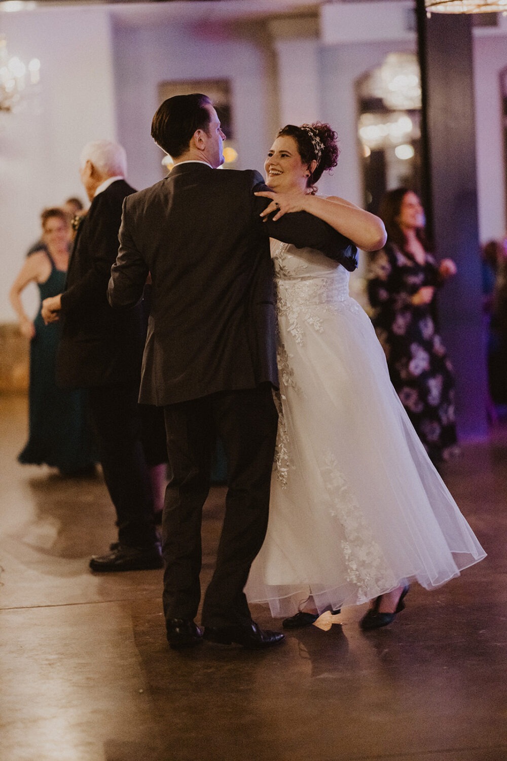couple dances during wedding reception 
