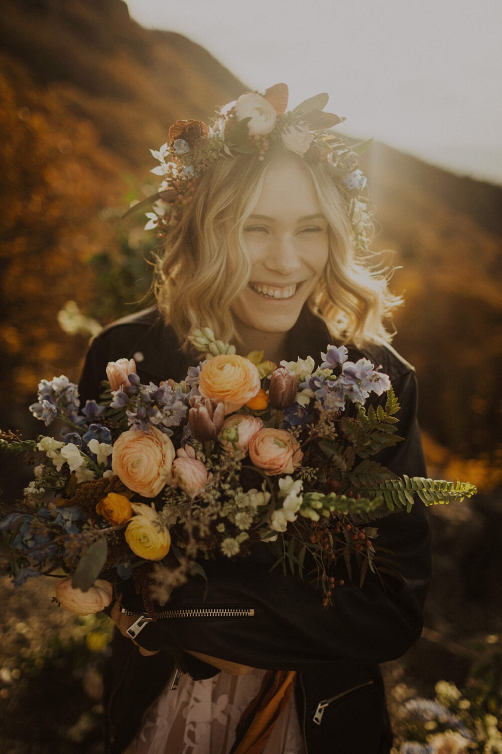 bride has boho chic bouquet and flower crown