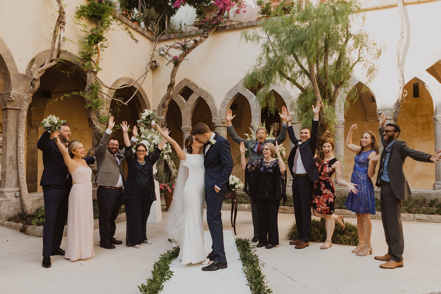 couple kisses at Italy destination wedding 