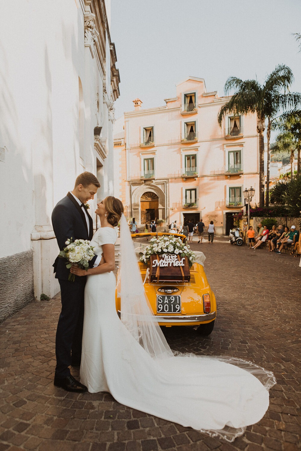 couple embraces at Italy destination wedding 