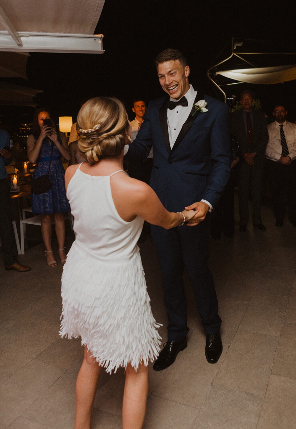 couple dances during wedding reception 