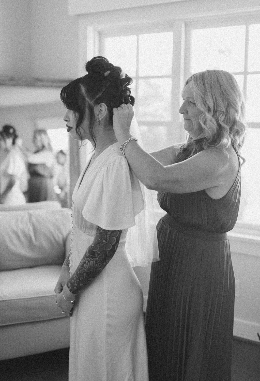 bride takes bridal portraits as part of photography wedding package