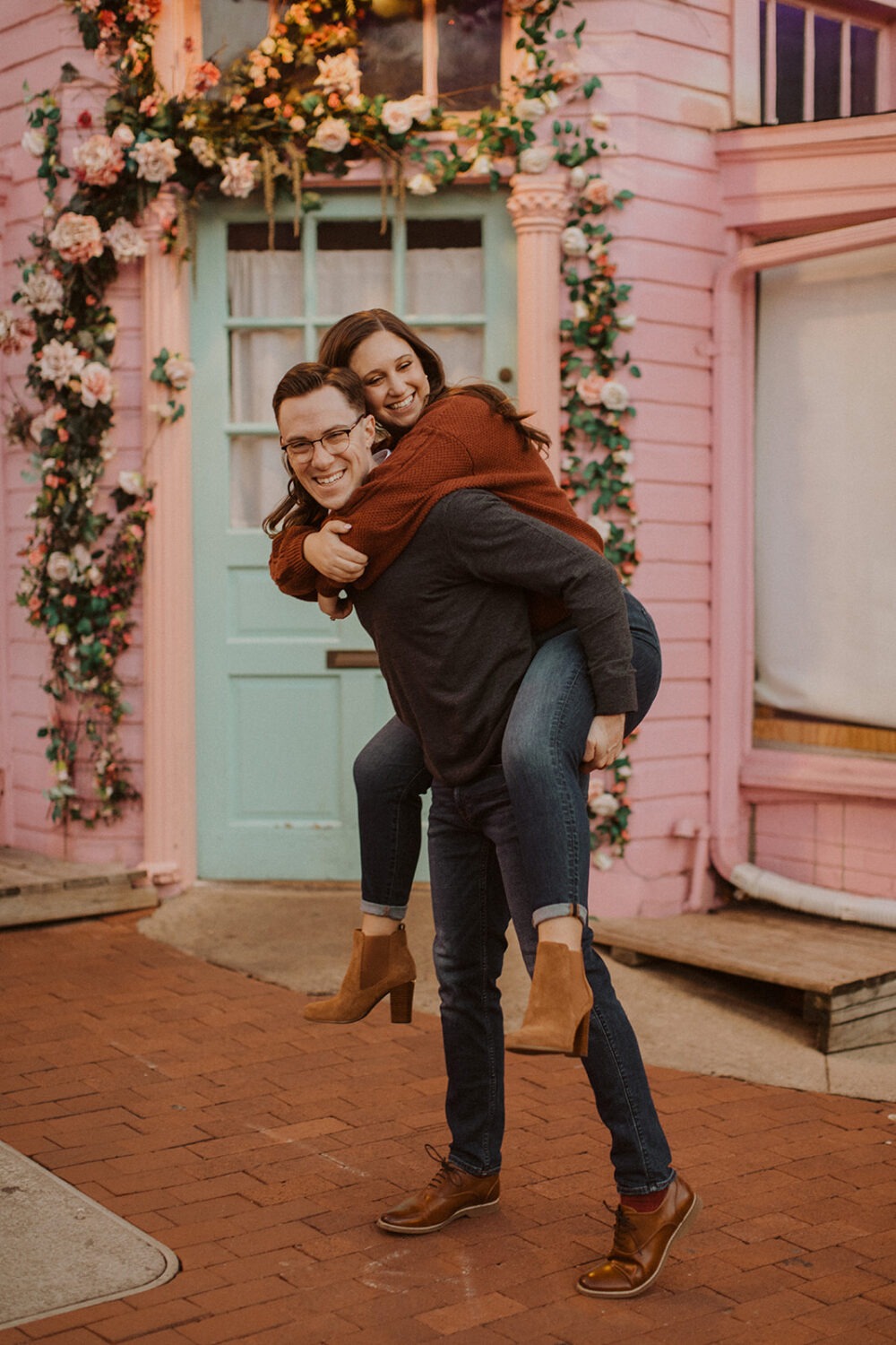 couple embraces at Georgetown engagement session