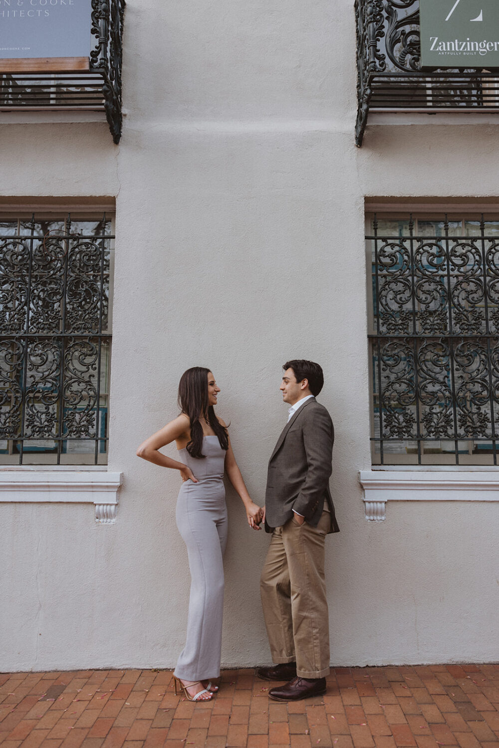 couple holds hands during Georgetown engagement shoot photos