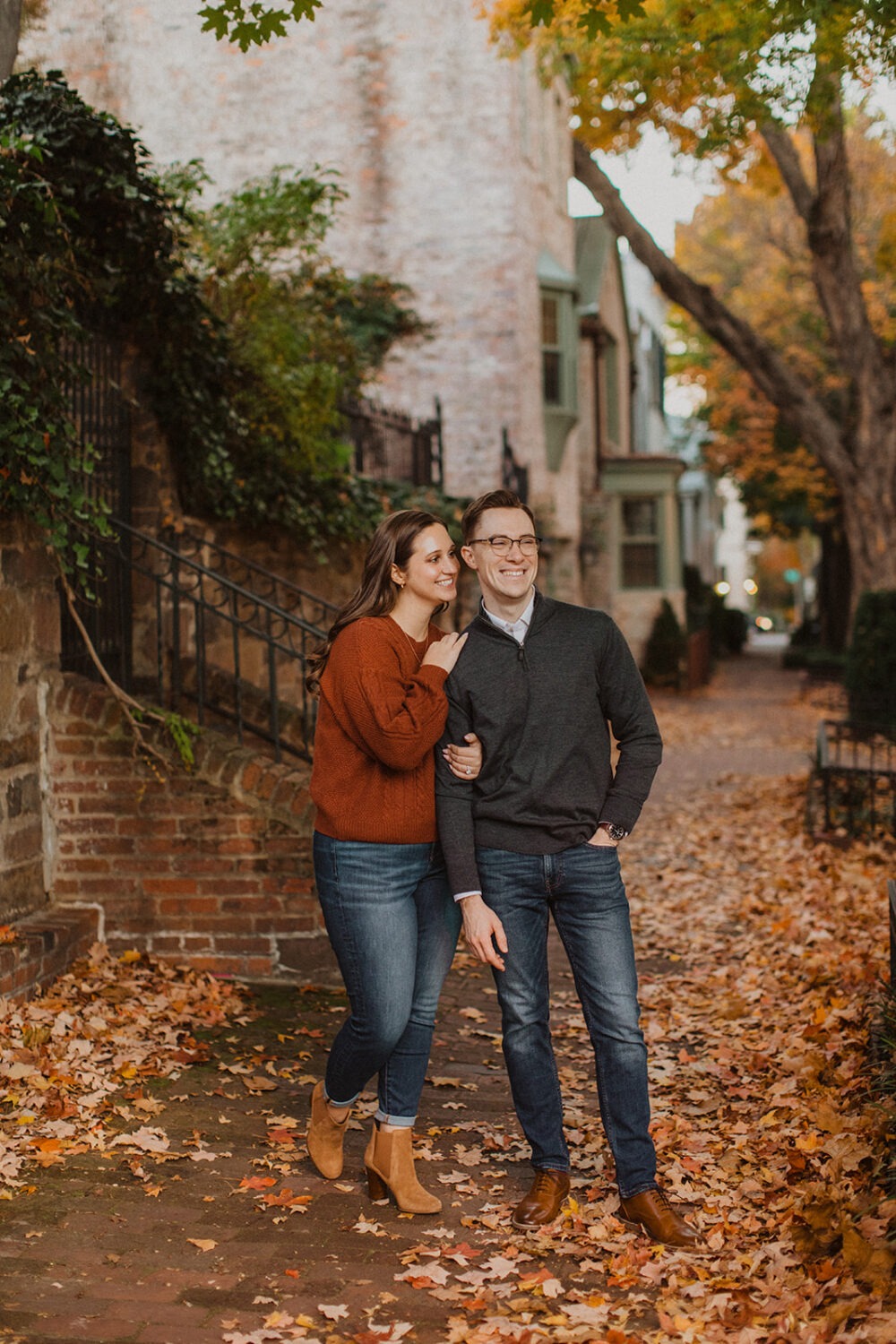 couple embraces during Georgetown engagement shoot photos