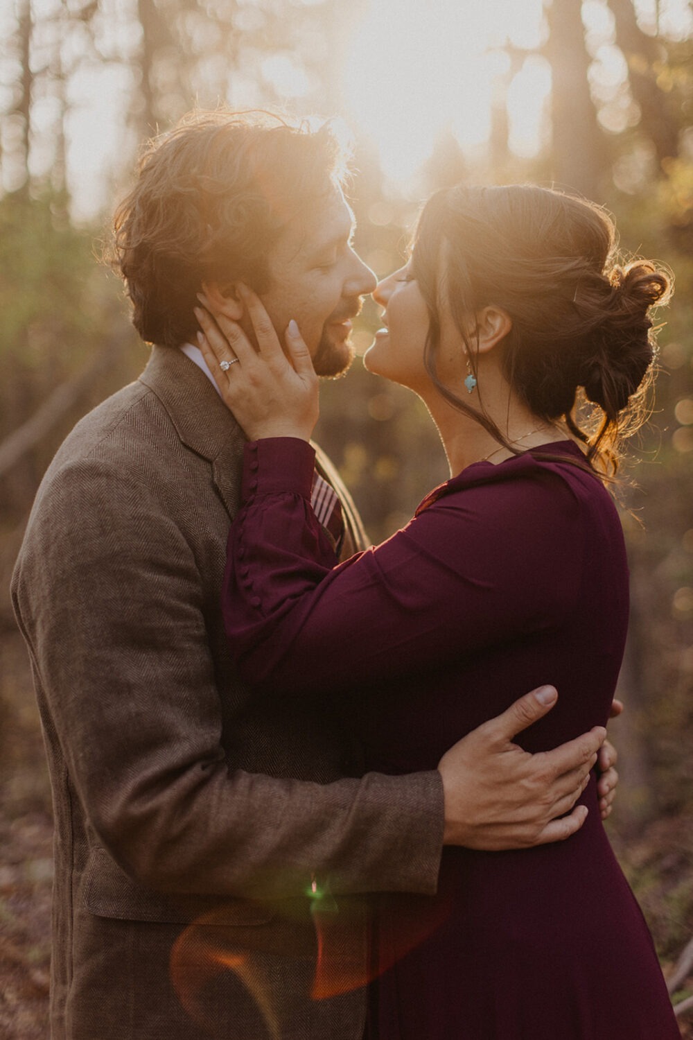 couple embraces at sunset photo shoot