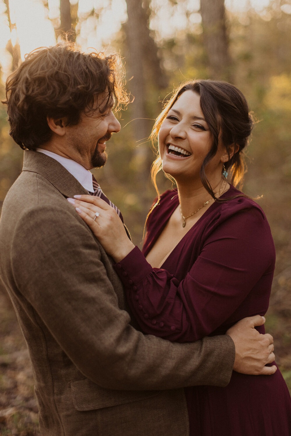 couple embraces at sunset couples shoot