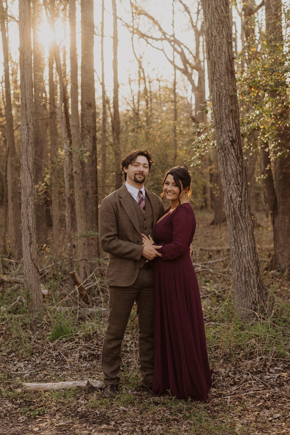 couple embraces at sunset photo shoot