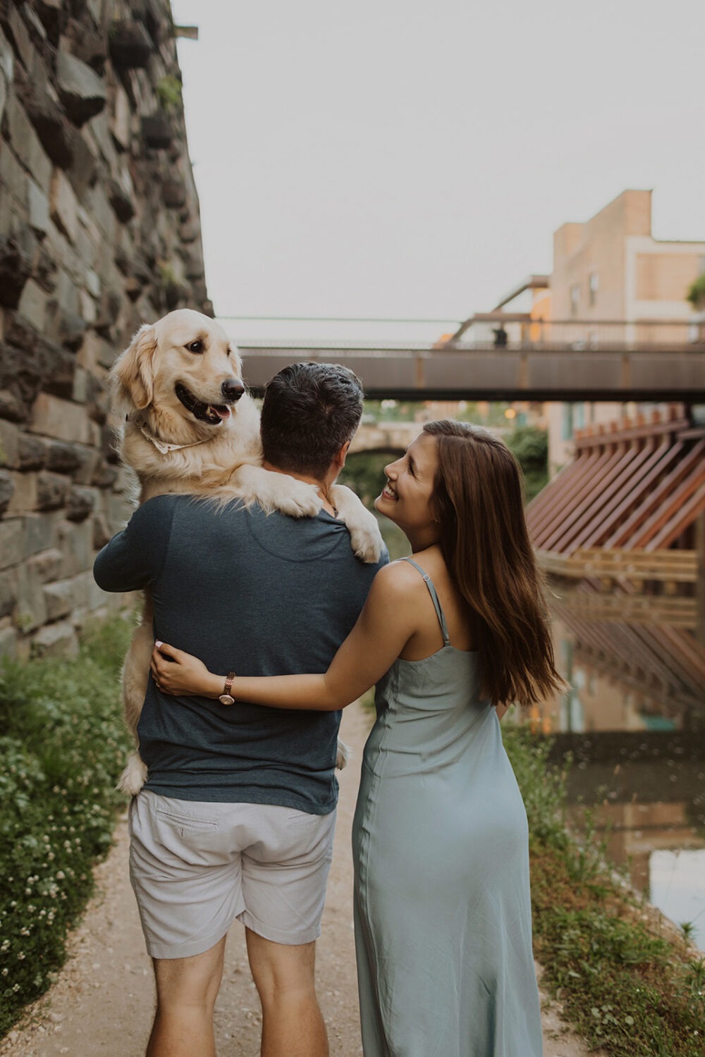 couple poses with dog at Georgetown engagement session