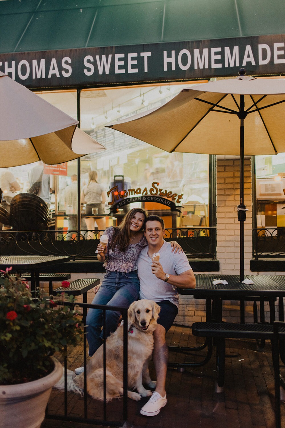 couple poses with dog at Georgetown engagement session