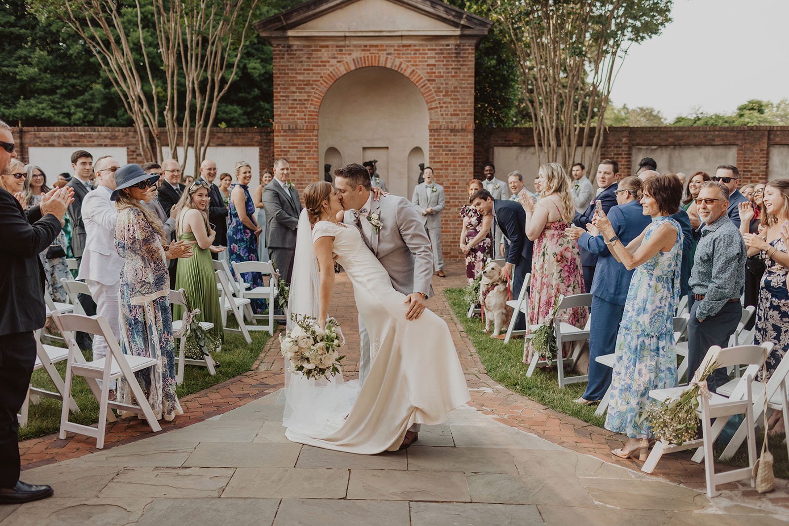 couple kisses at Dumbarton House wedding