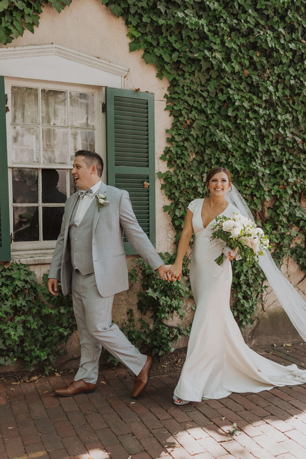 couple walks at Georgetown Washington DC wedding