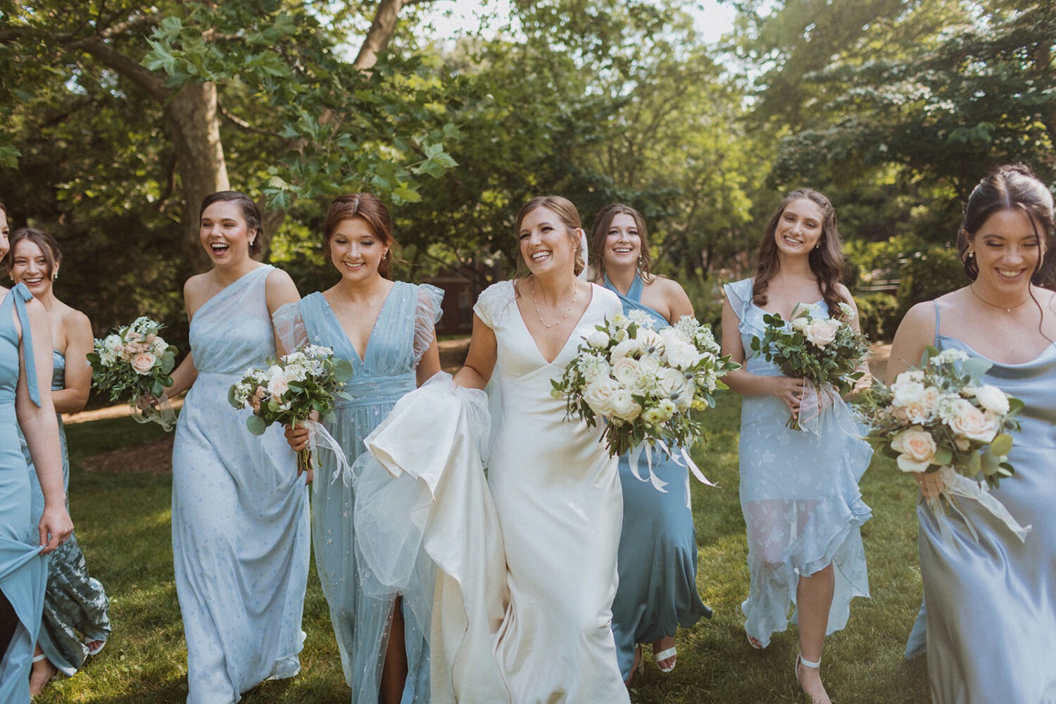 bride walks with bridesmaids  at Dumbarton House wedding