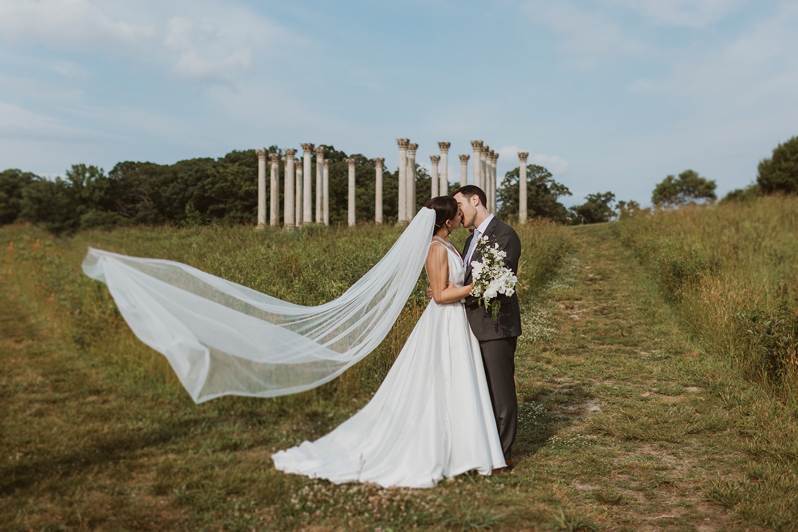 couple kisses at Arboretum DC wedding