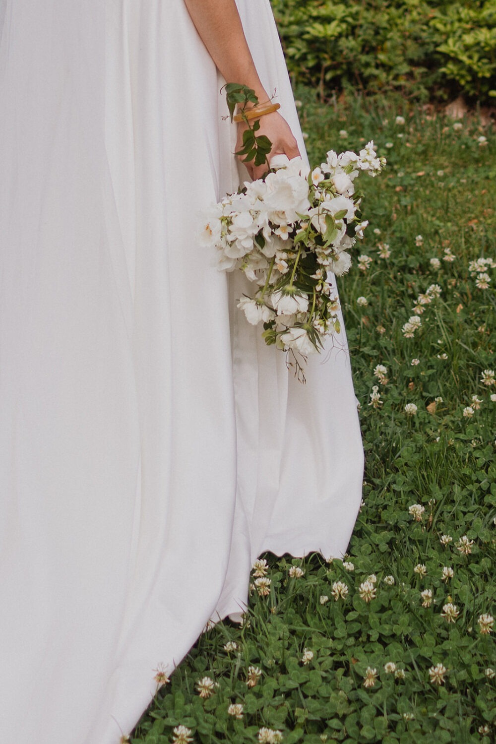 bride walks through field at National Arboretum DC wedding
