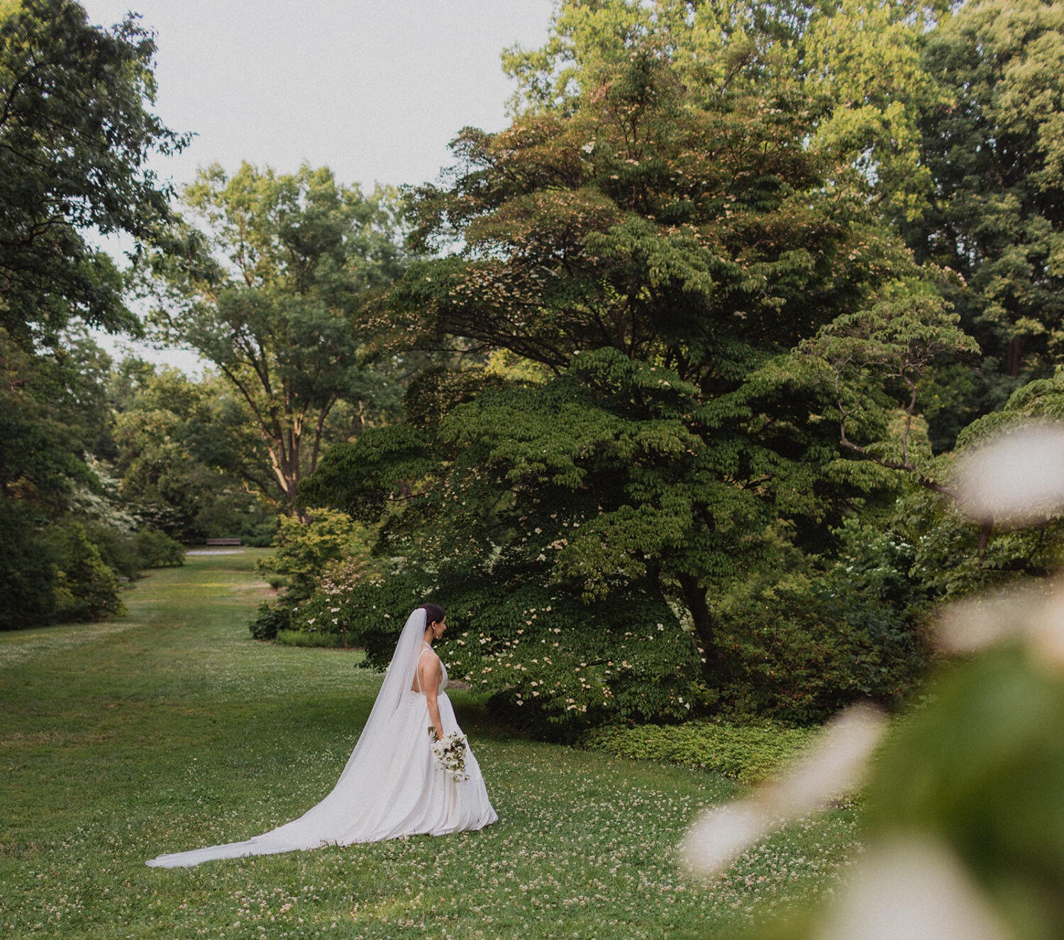 bride walks through field at National Arboretum DC wedding
