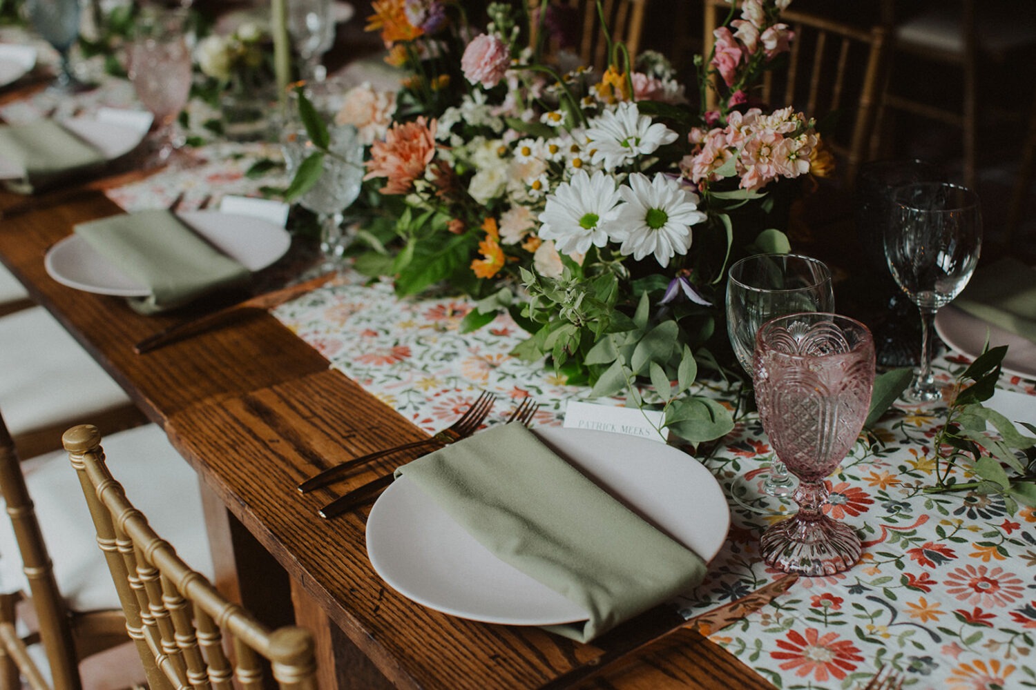 wedding floral decor and greenery on table settings