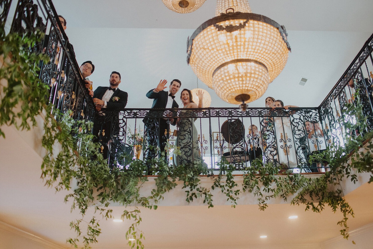 wedding party waves during wedding reception