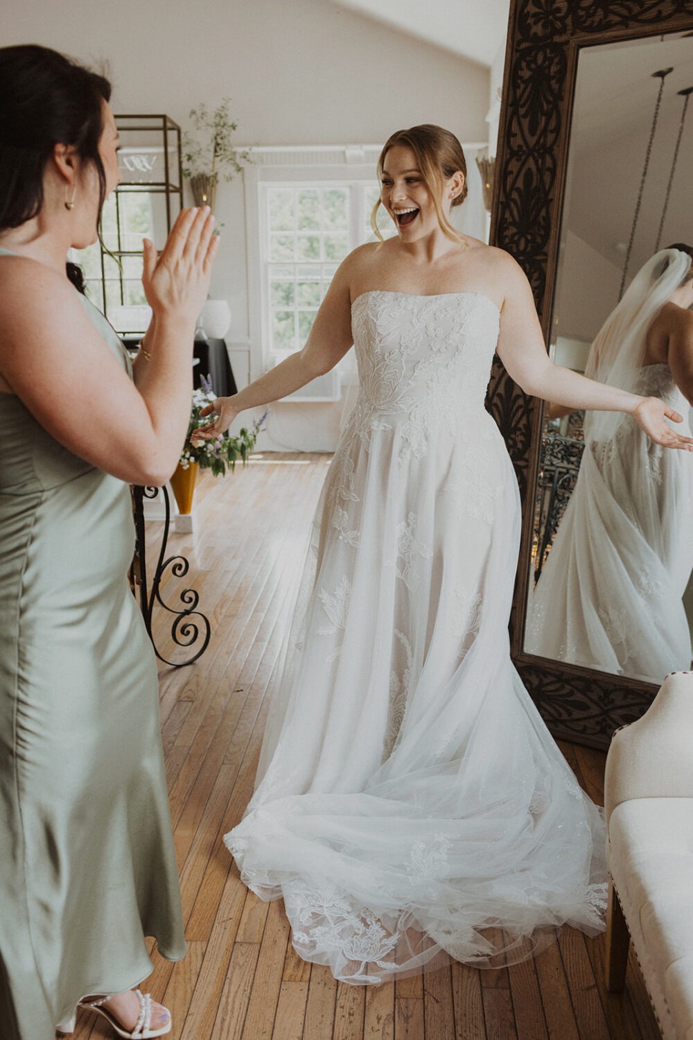 bride surprises bridesmaids with wedding first look