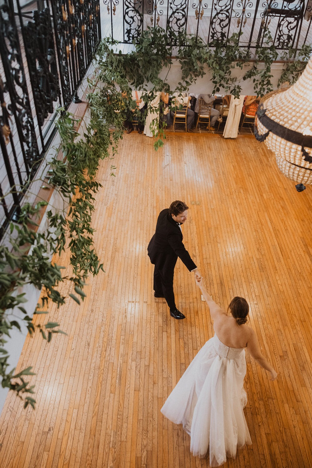 couple dances on wedding dance floor during reception 