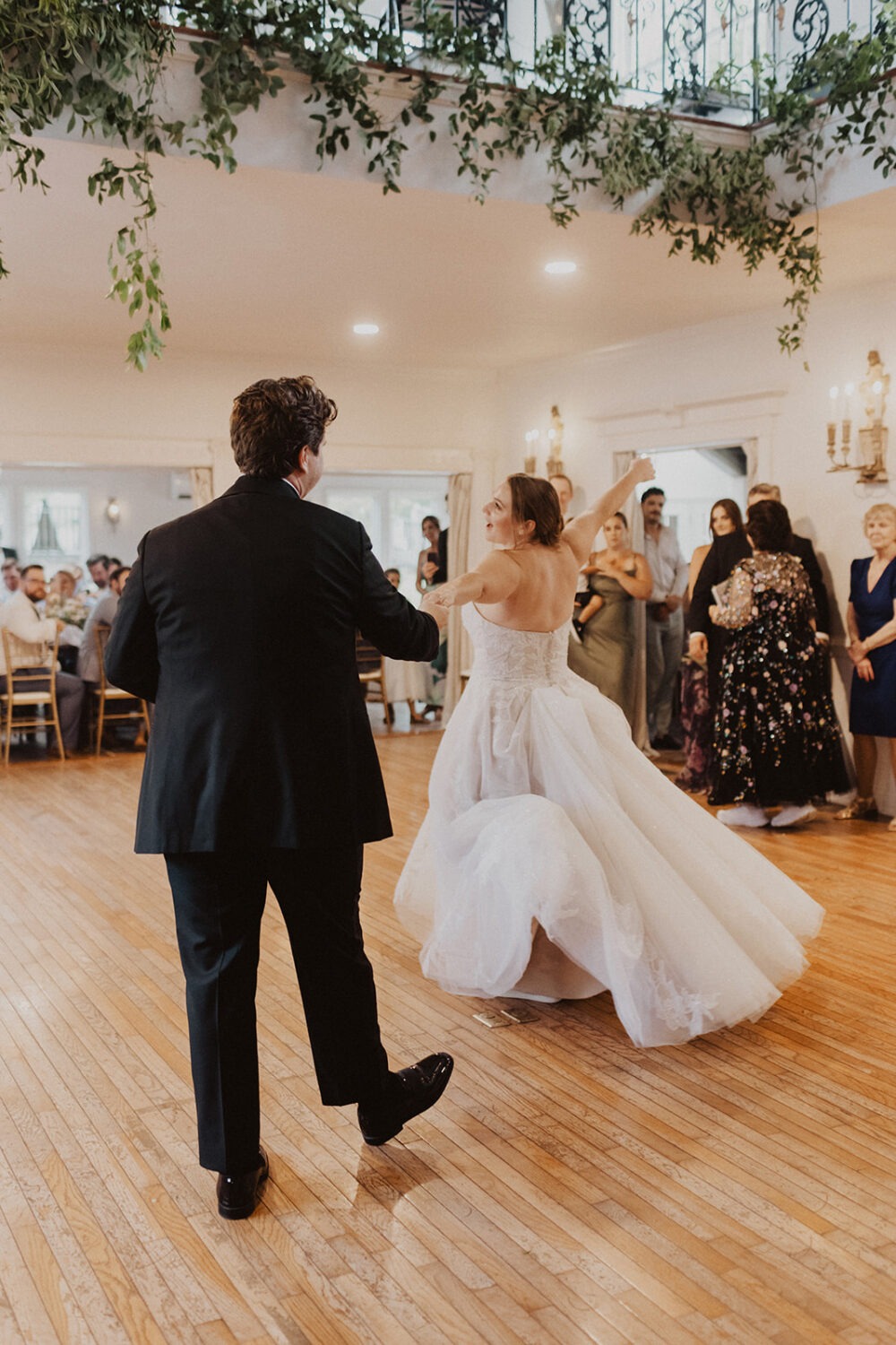 couple dances during wedding reception