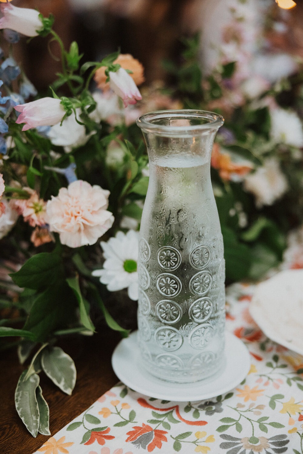 florals and greenery as wedding table settings