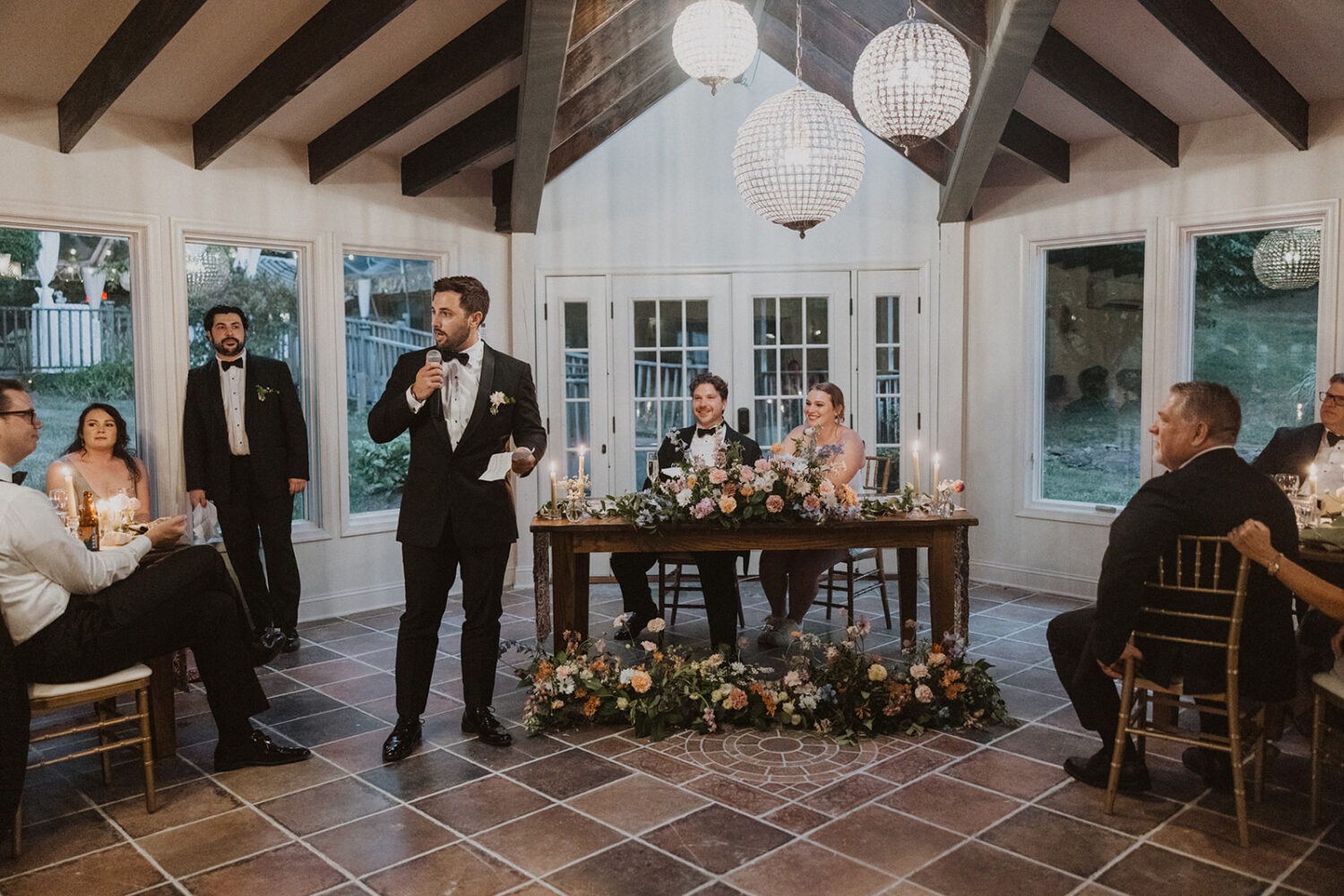 wedding party gives speeches to couple at The Manor at Airmont reception