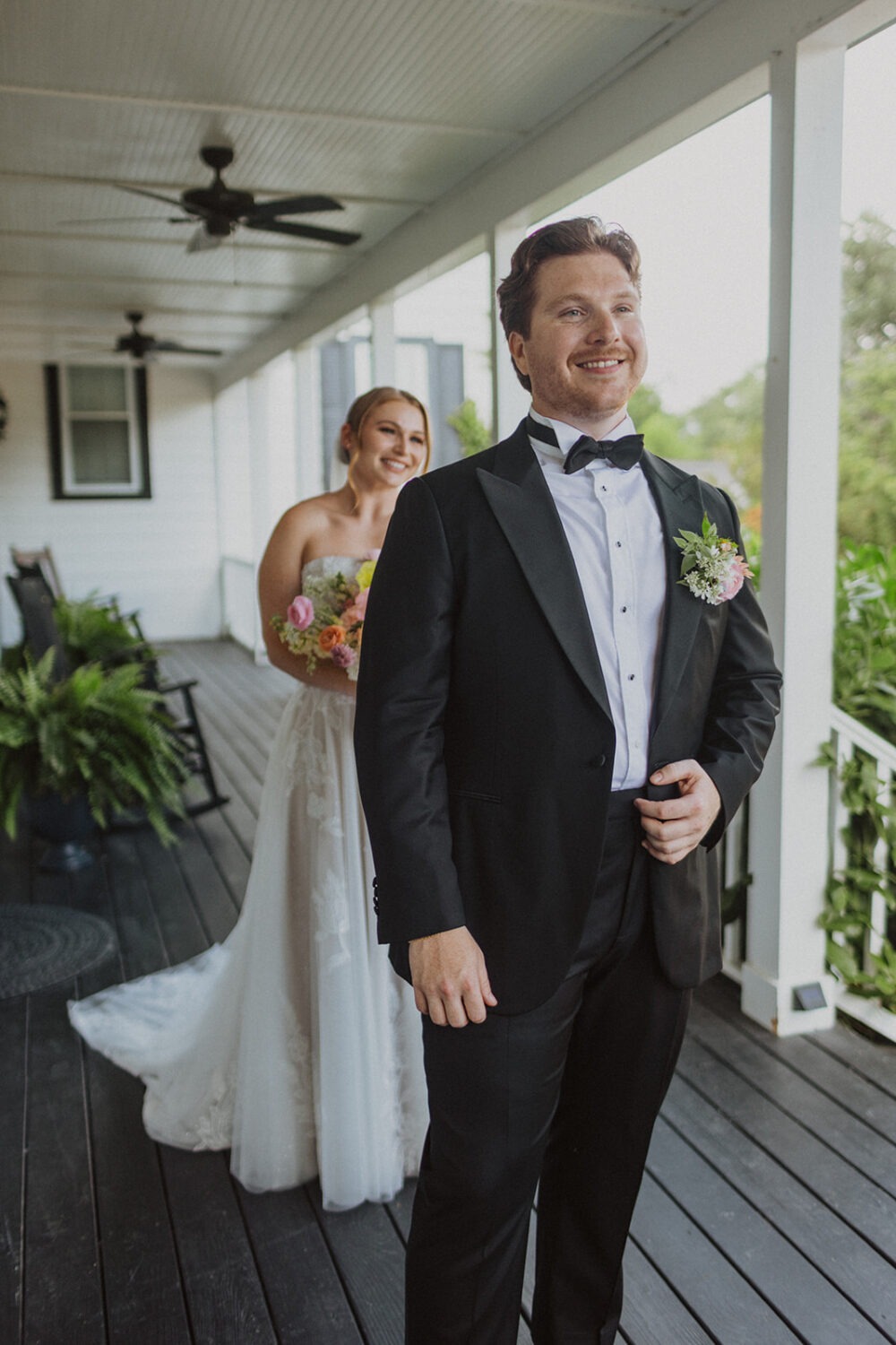 bride surprises groom during wedding first look