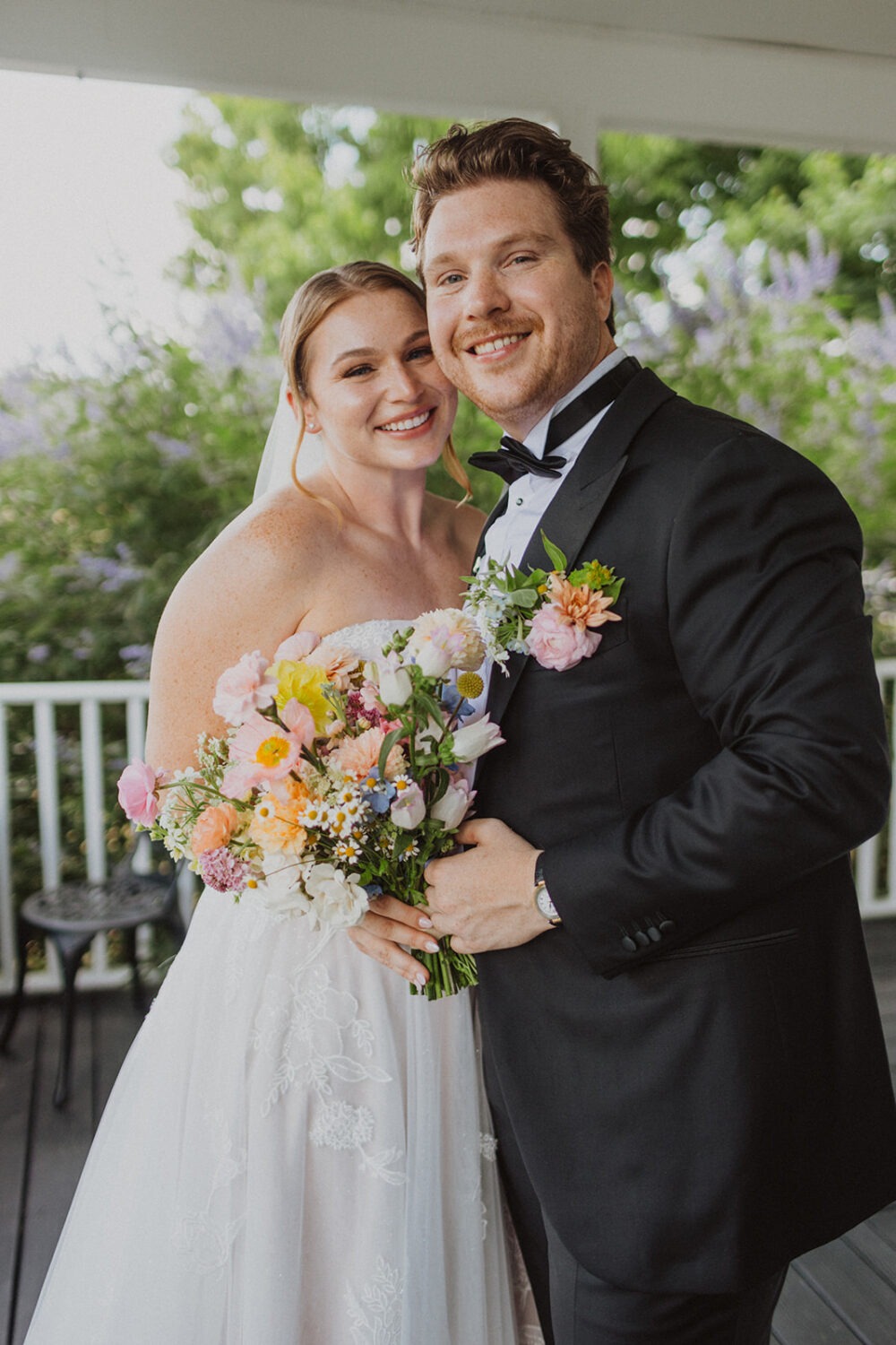 couple embraces at The Manor at Airmont wedding