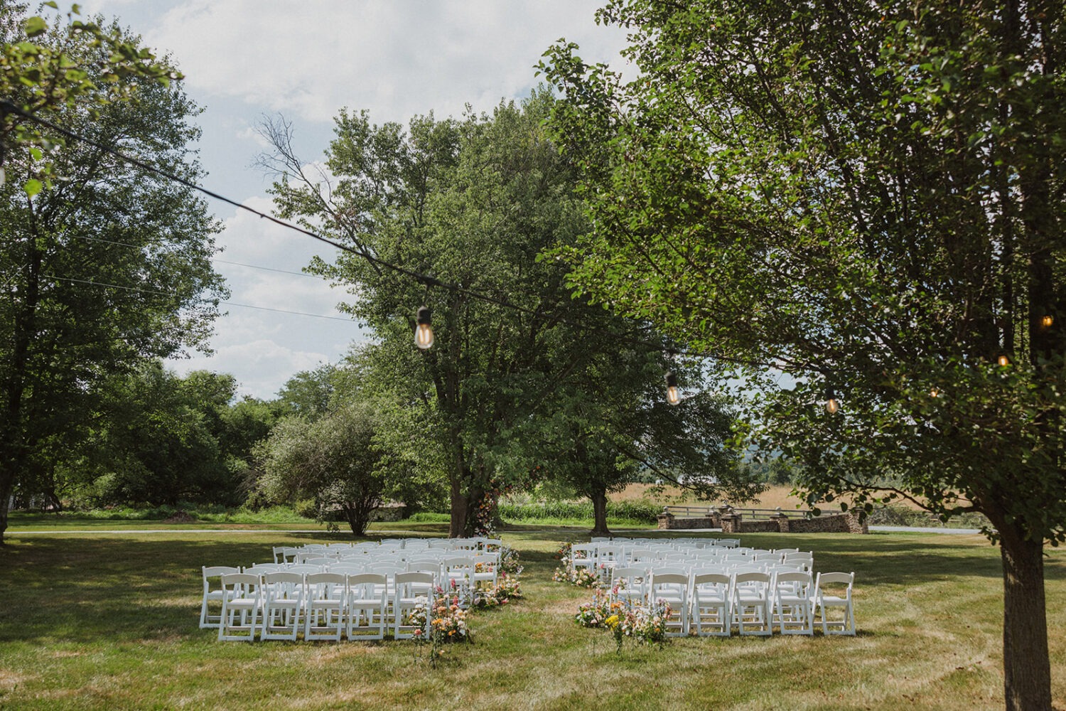 ceremony chairs and florals at The Manor at Airmont wedding