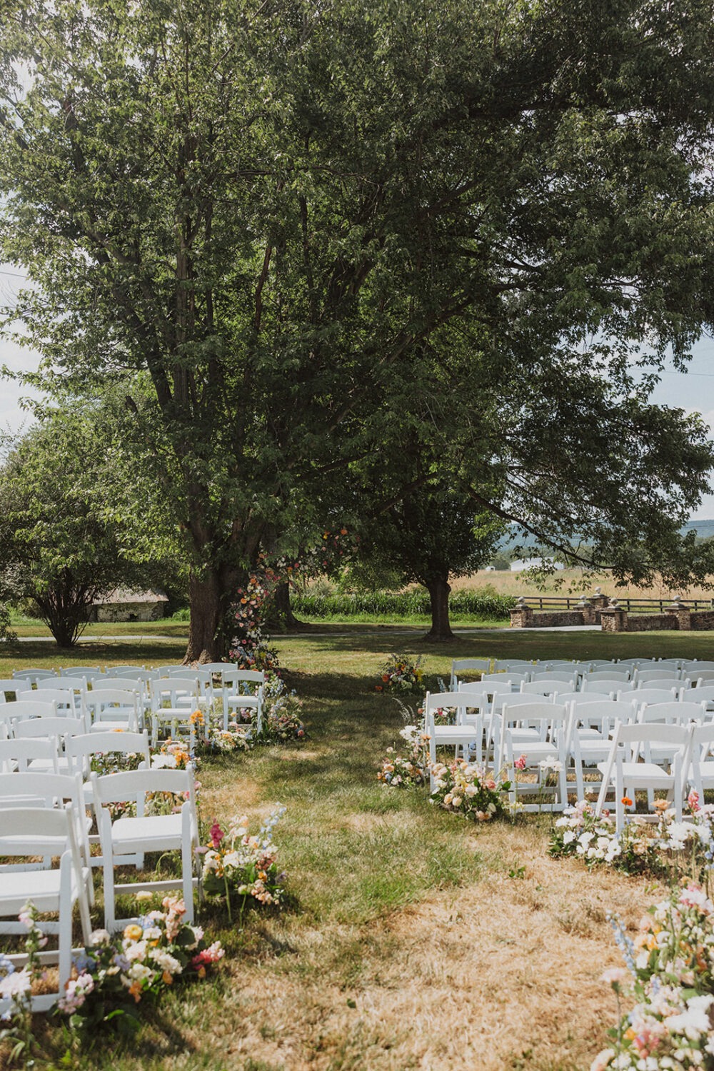 wedding florals in wedding ceremony decor at The Manor at Airmont wedding