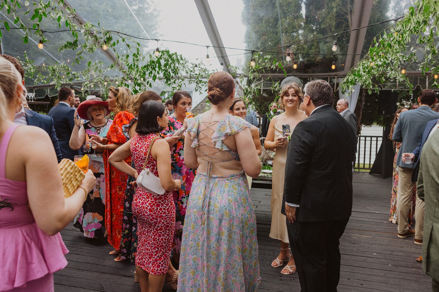 wedding guests mingle at The Manor at Airmont cocktail hour