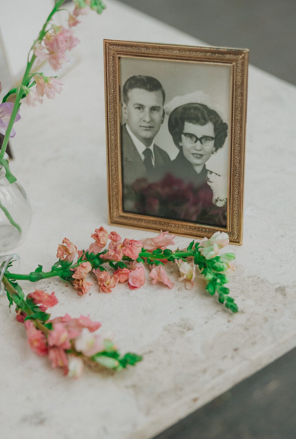 framed family photos as wedding decor