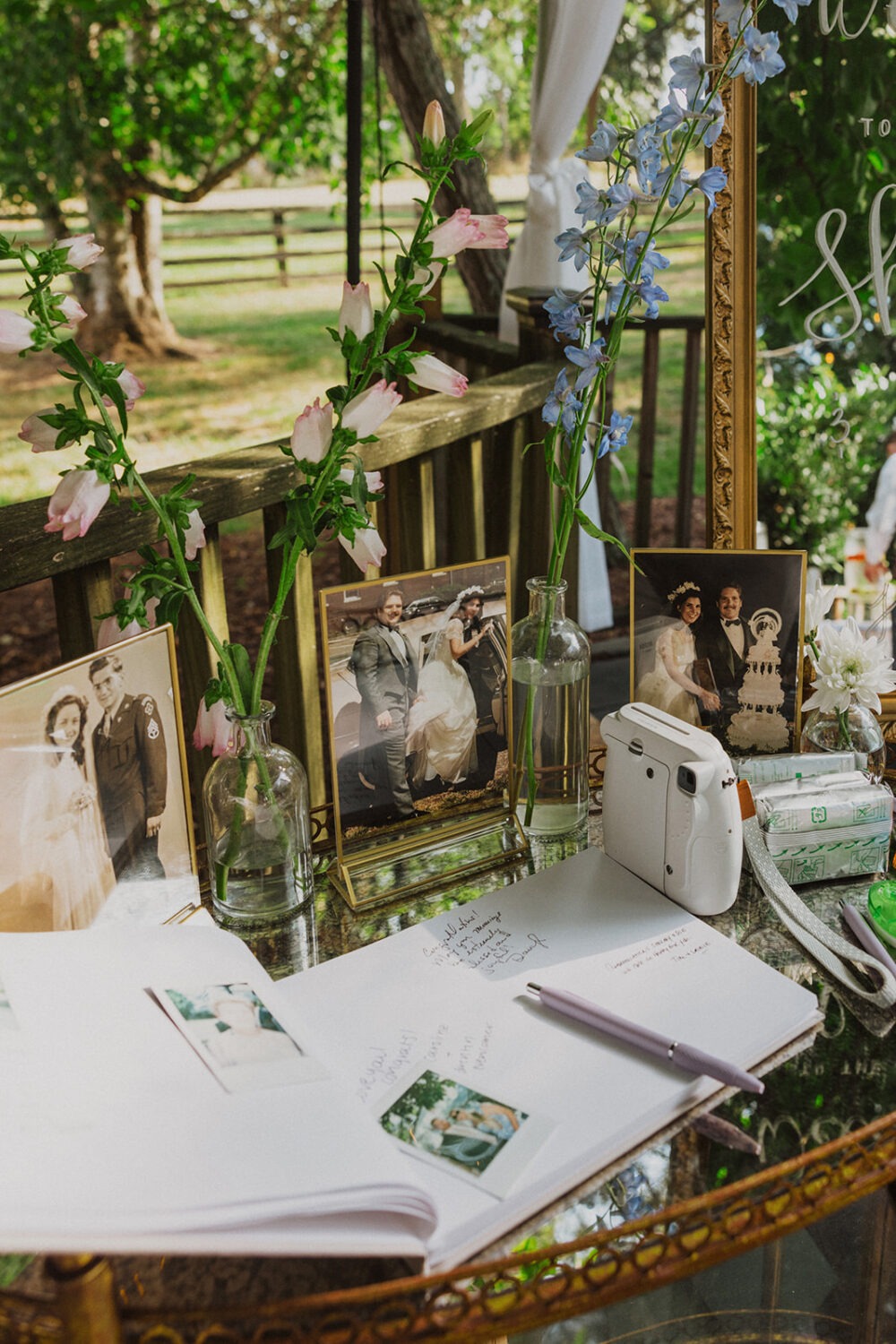 framed family photos as wedding decor