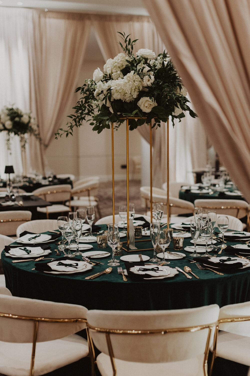 greenery and white florals wedding reception decor