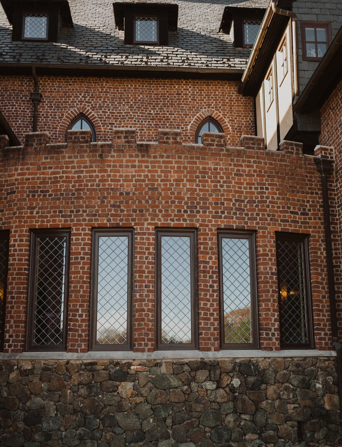 brick, stone and glass of the Dover Hall Virginia wedding venue