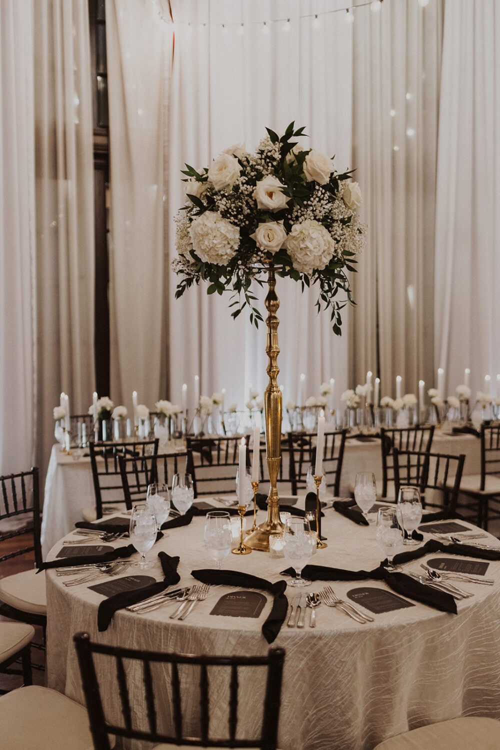 white and black wedding reception decor and florals