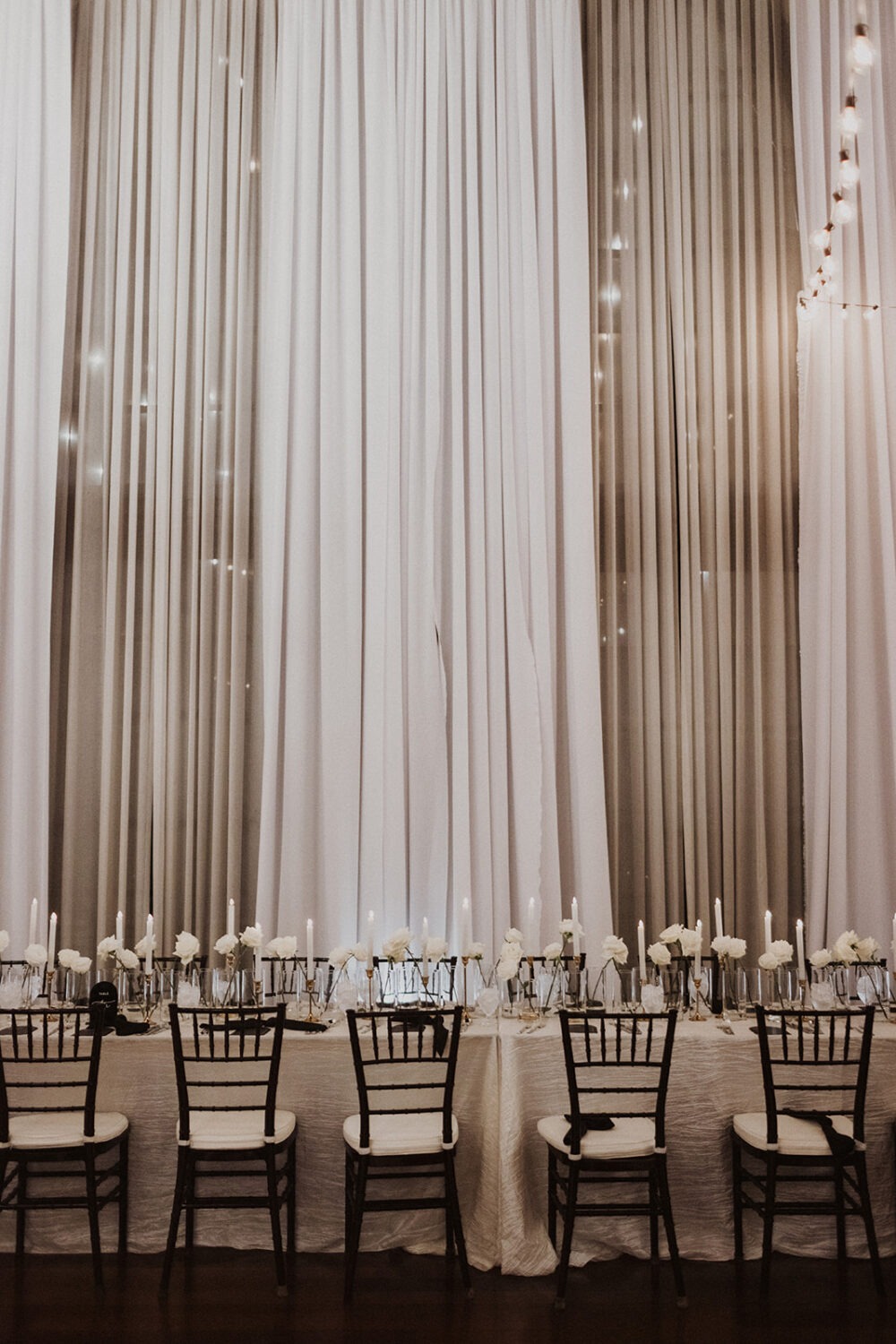 white and black wedding reception decor and florals