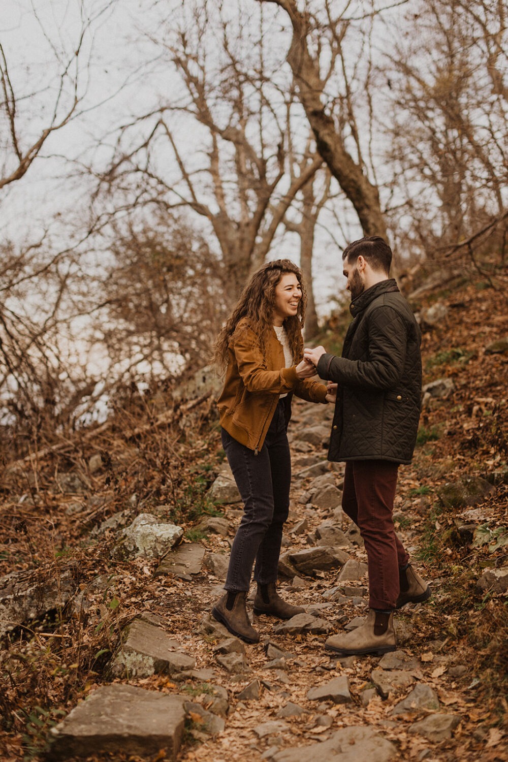 couple hikes path for Shenandoah fall engagement photos