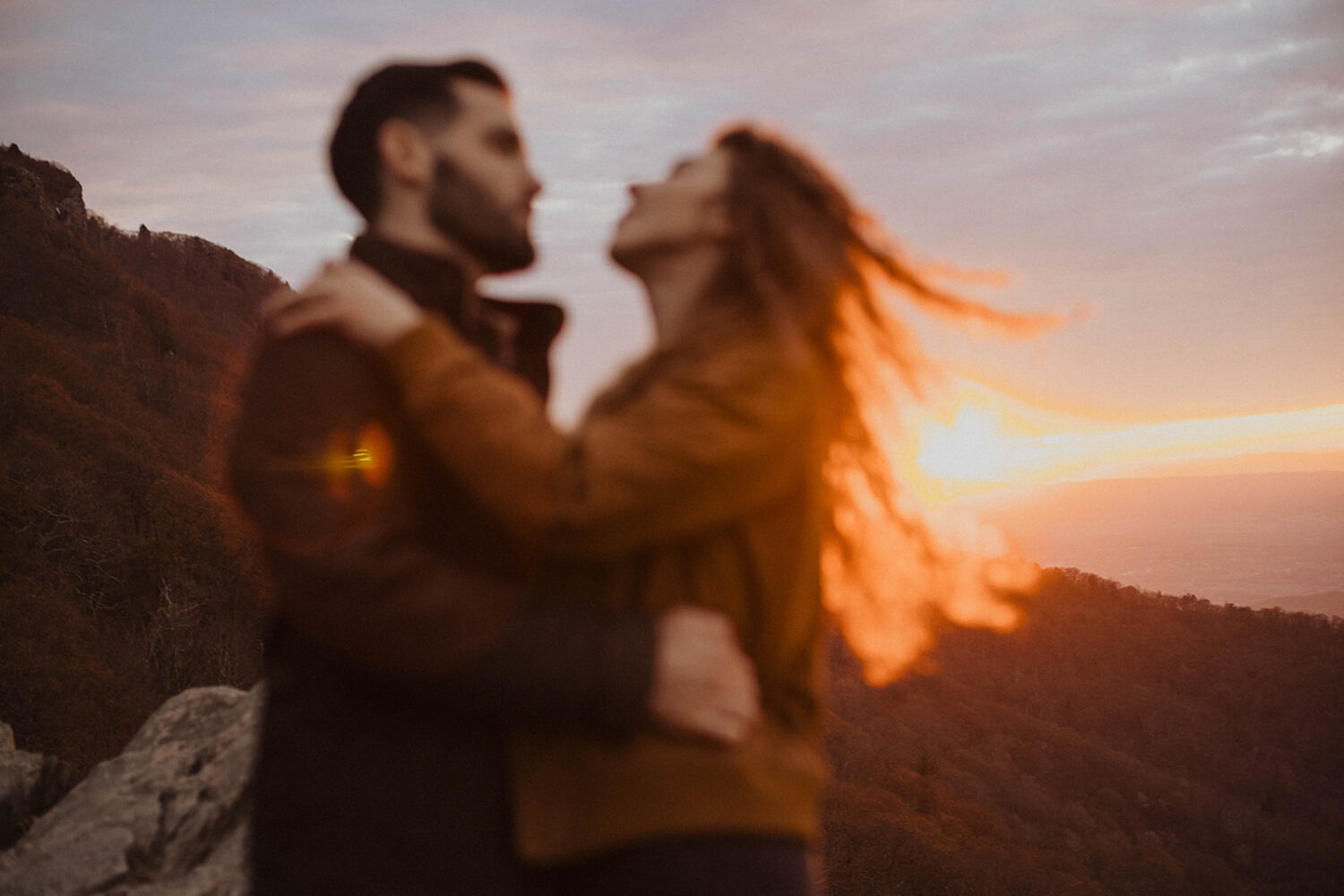 couple embraces during Shenandoah National Park engagement