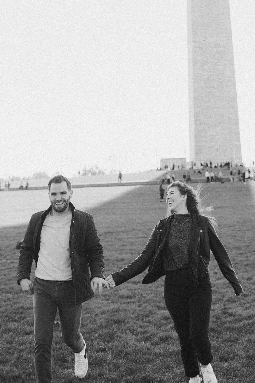 couple holds hands at Washingtion DC outdoor engagement session