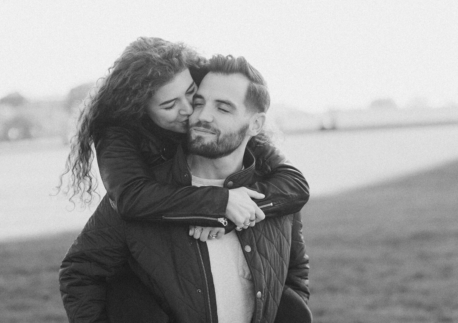 couple kisses at Washingtion DC outdoor engagement session