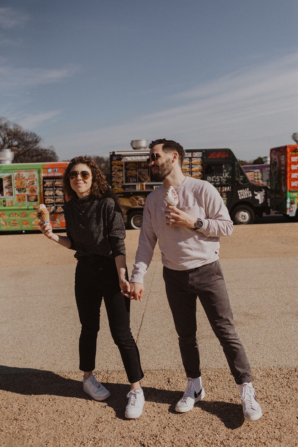 couple eats ice cream at outdoor DC engagement session