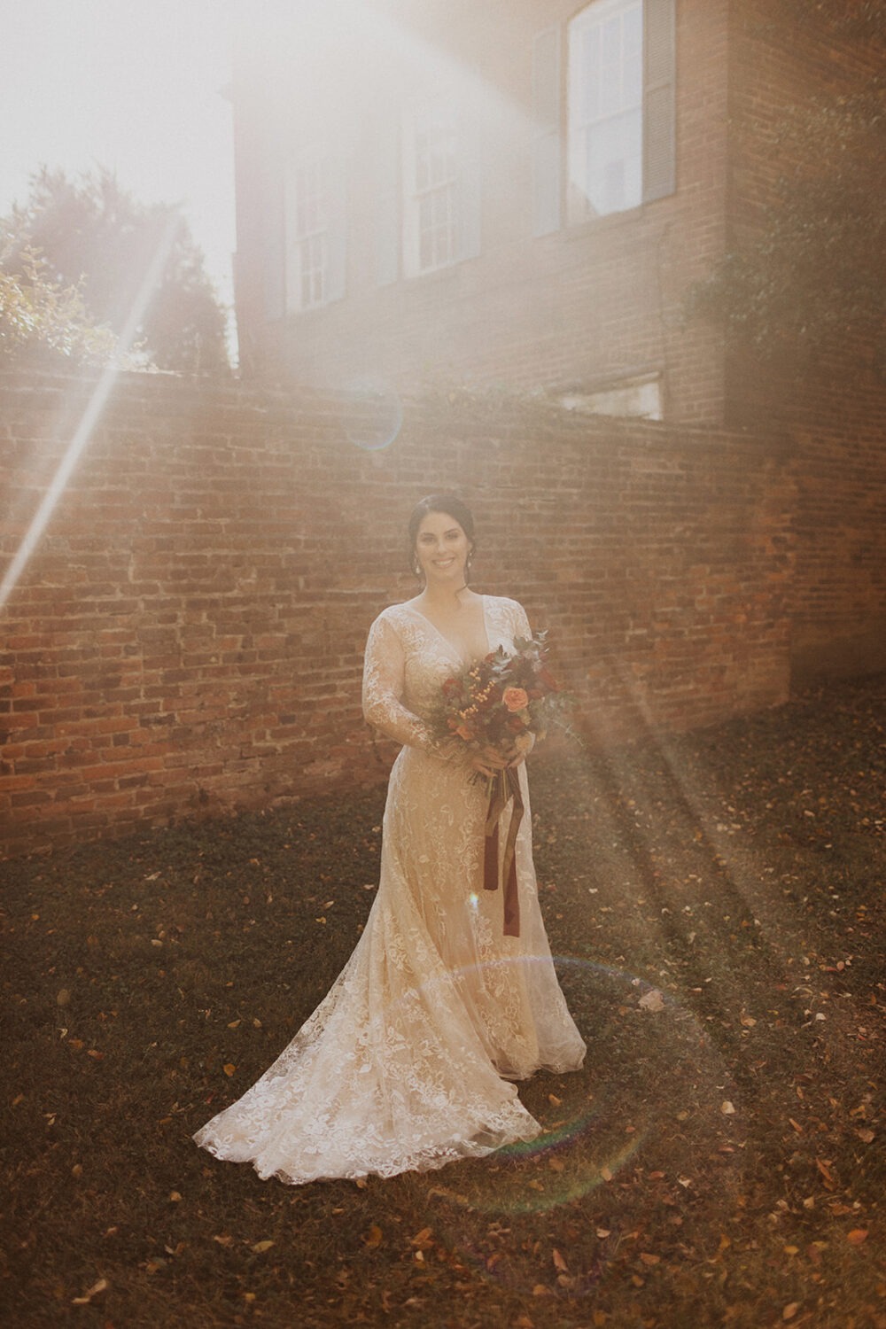 bride poses with wedding bouquet 