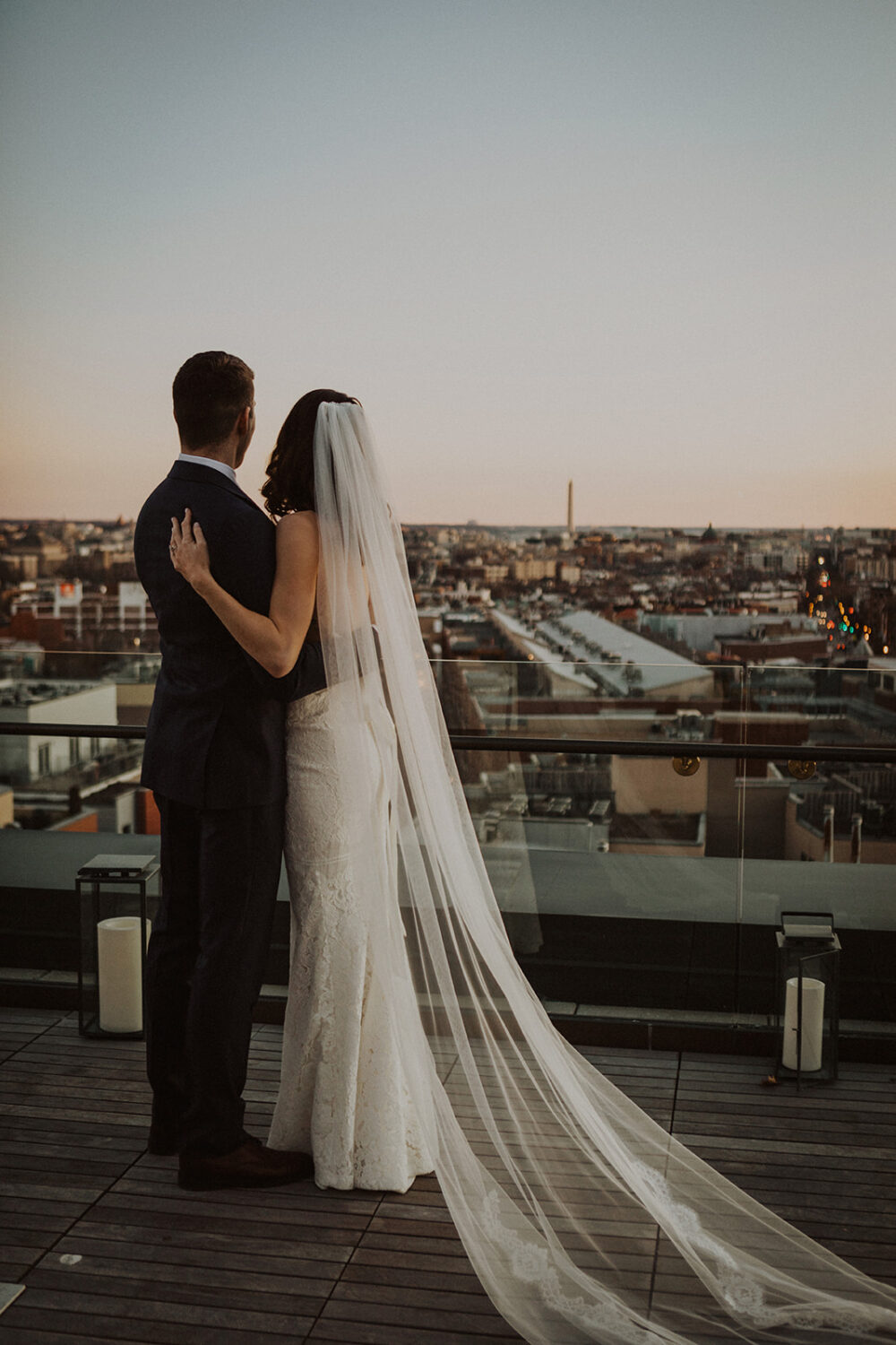 couple embraces at rooftop venues in DC 