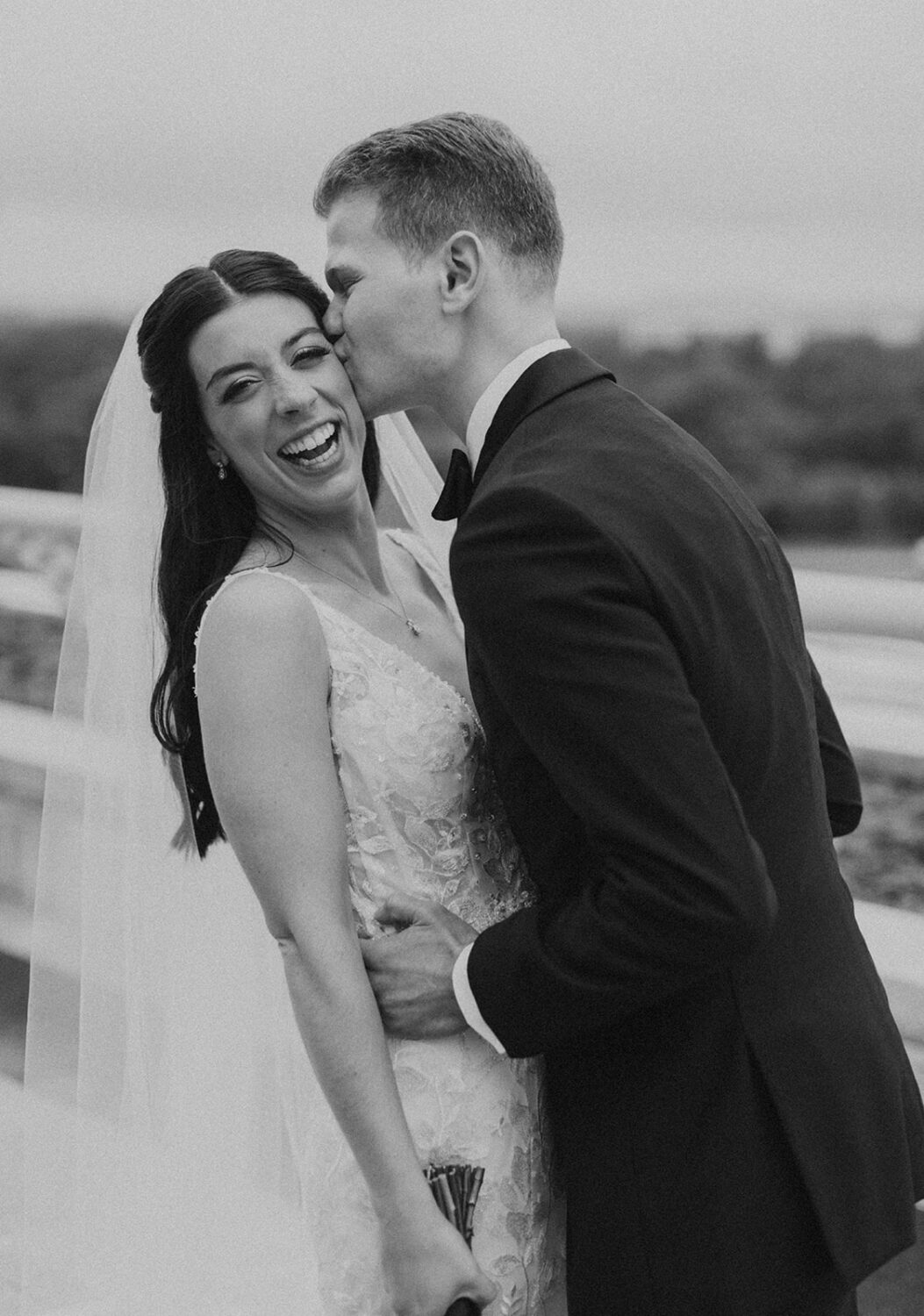 couple kisses at outdoor DC elopement