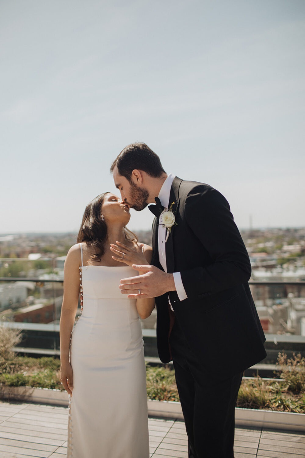 couple kisses at rooftop venues in DC 